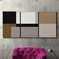 Three-panel canvas wall art featuring geometric abstract centerpoint composition, displayed in a living room above a suede accent chair.