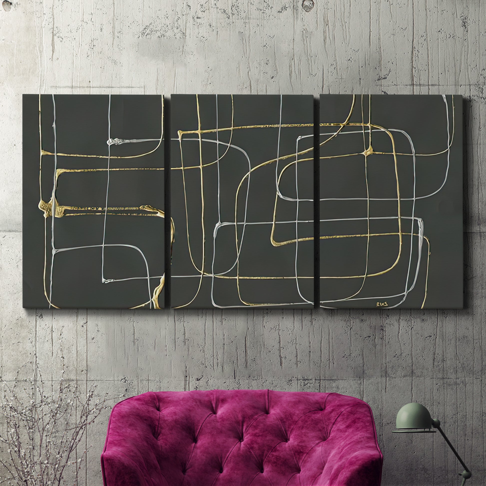 Three-panel canvas wall art featuring linear abstract conduit pattern, displayed in a living room above a suede accent chair.