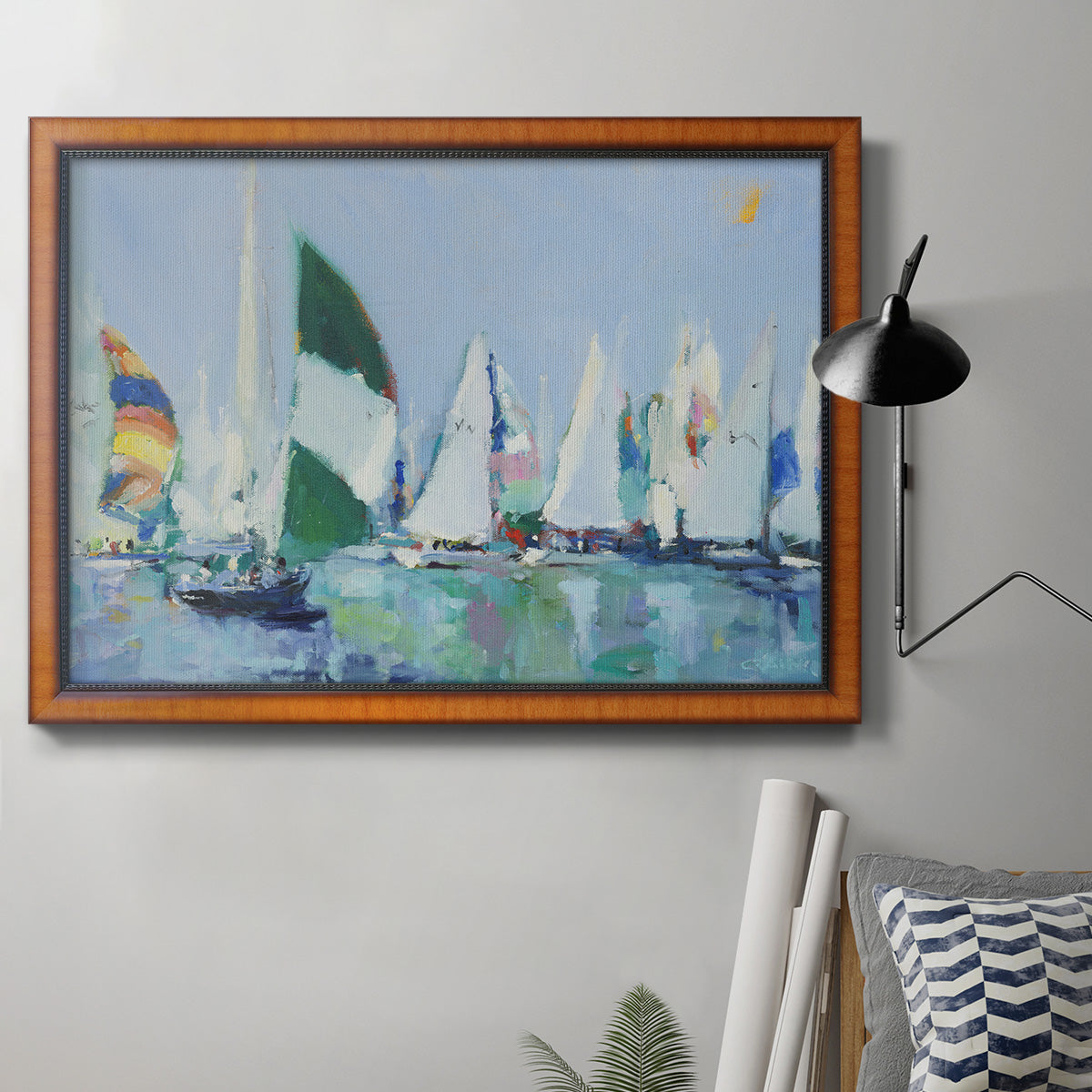 Coastal harbor watercolor painting in an ornate vintage burl wood frame displayed in a neutral interior setting.