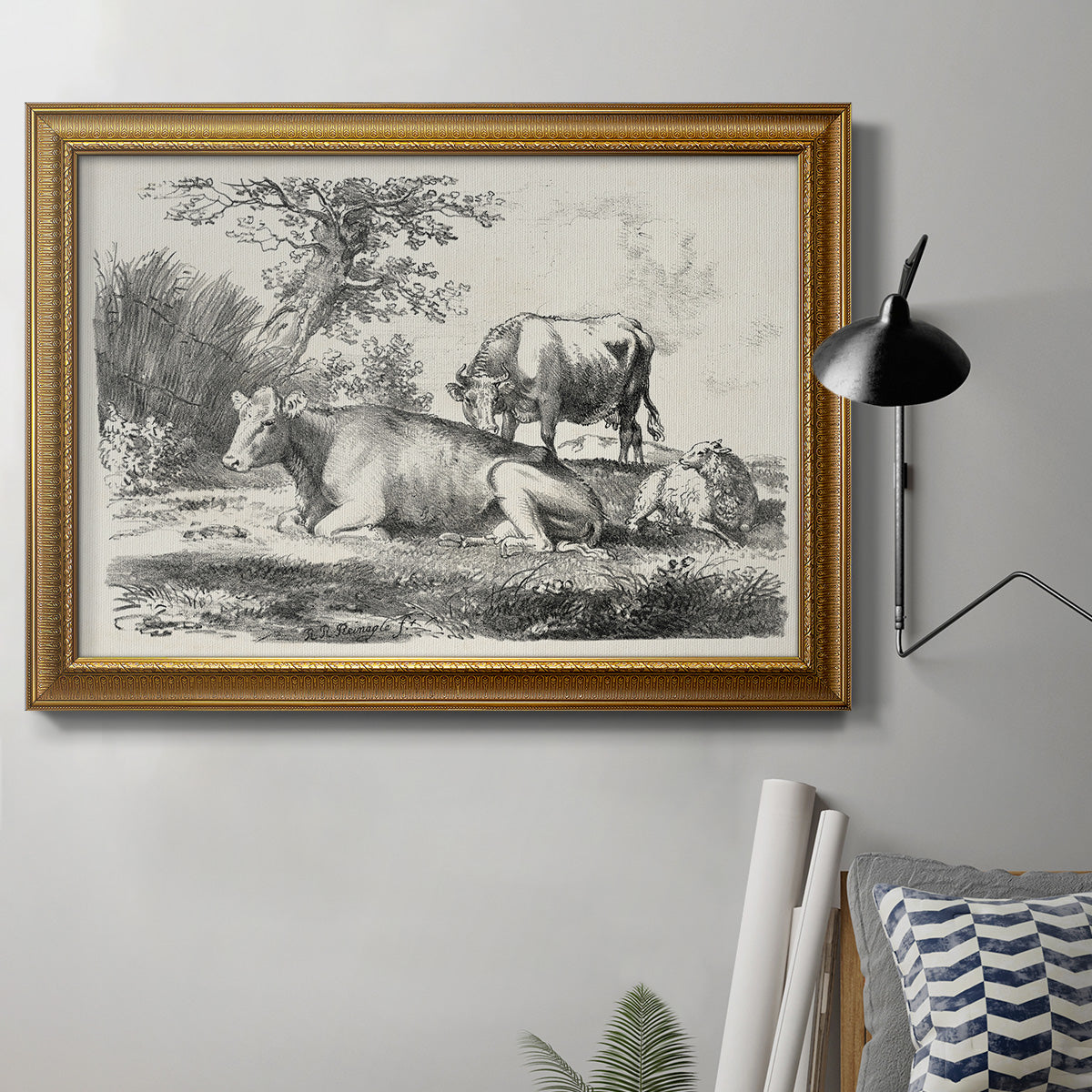 Classical pastoral landscape artwork by Nicolas Berchem in an ornate traditional gold frame displayed in a neutral interior setting.