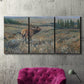 Three-panel canvas wall art featuring western wildlife grazing in open field, displayed in a living room above a suede accent chair.