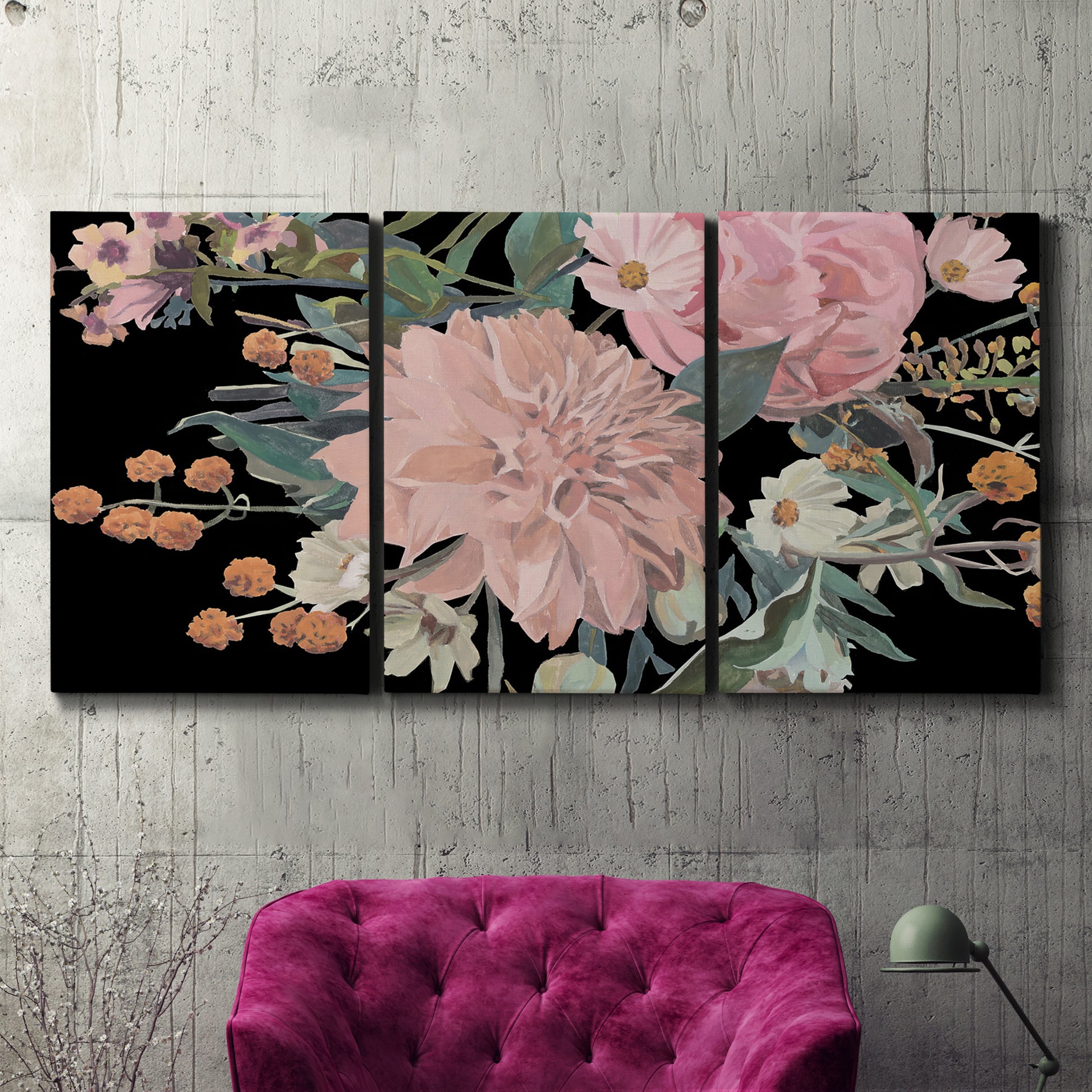 Three-panel canvas wall art featuring dark floral night blossoms, displayed in a living room above a suede accent chair.