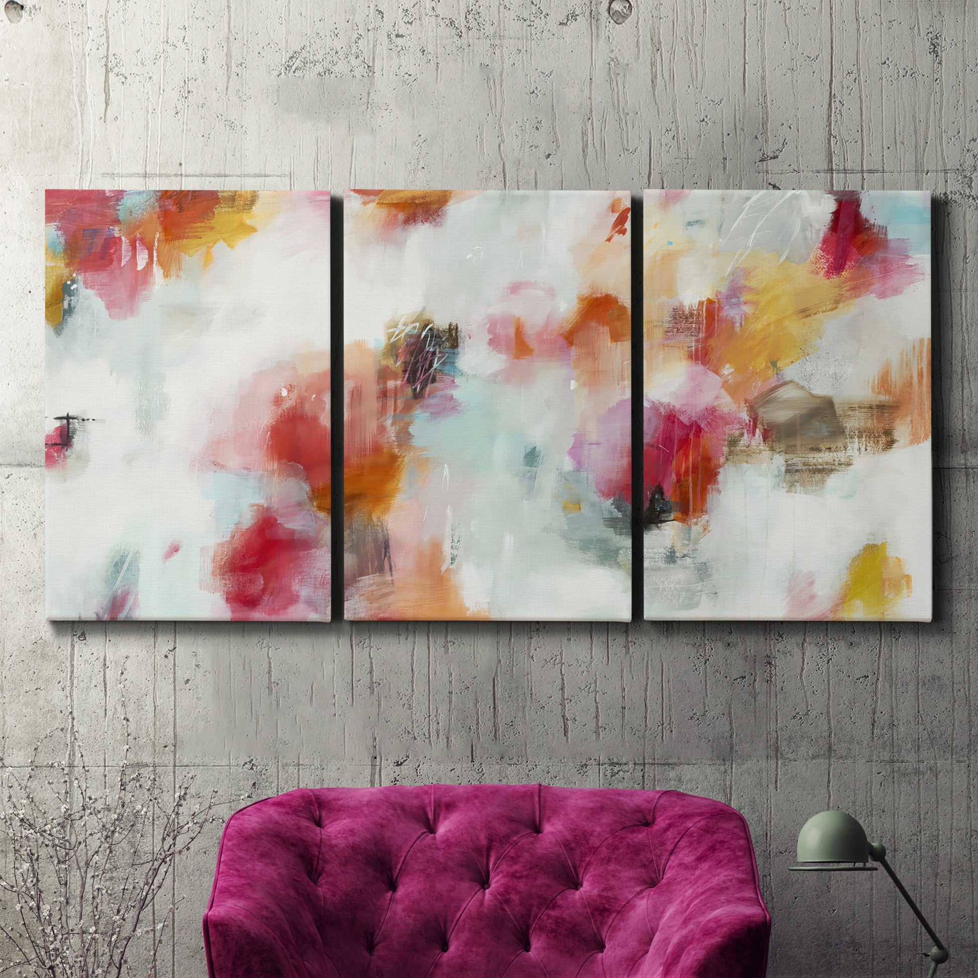 Three-panel canvas wall art featuring abstract directional visual shift, displayed in a living room above a suede accent chair.