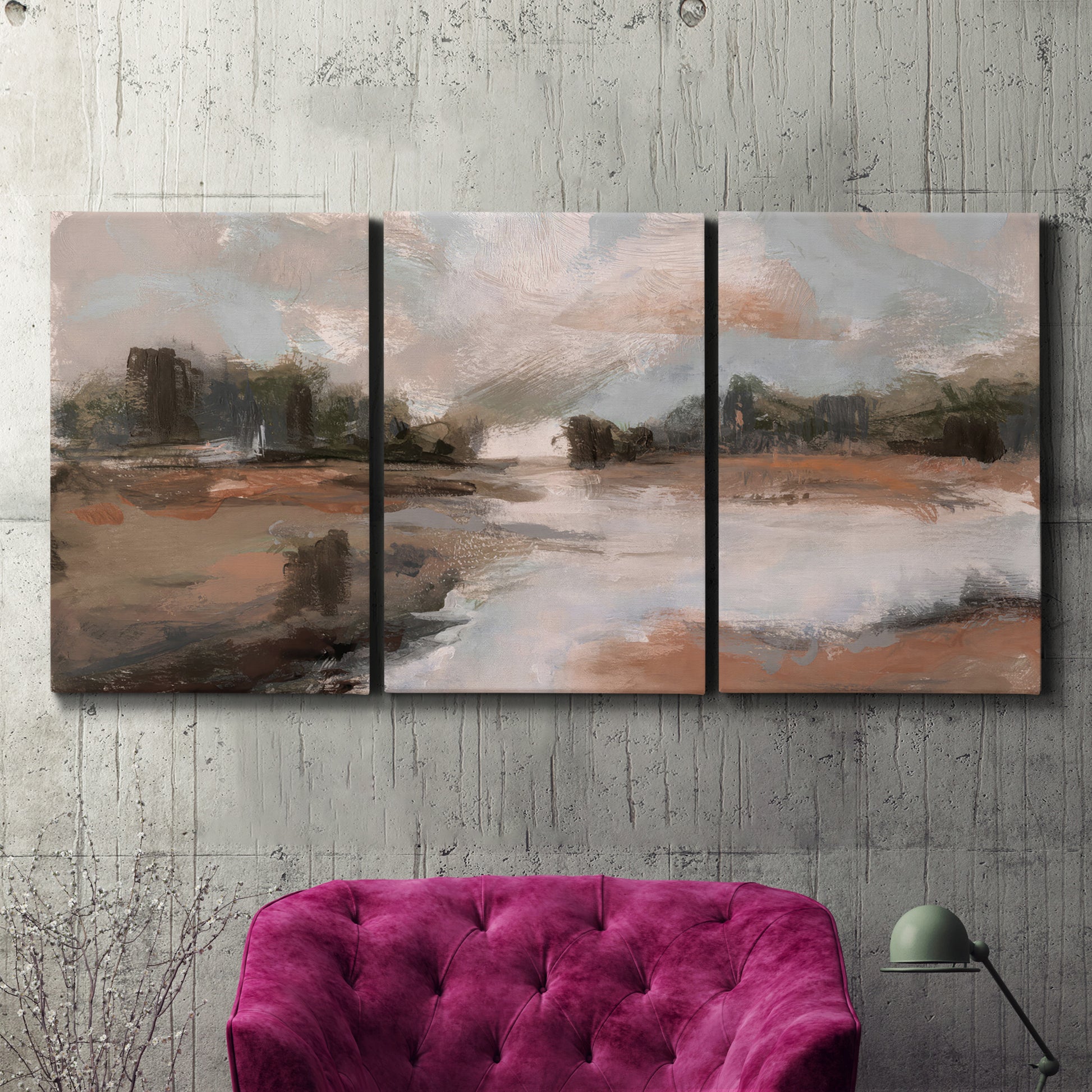 Three-panel canvas wall art featuring quiet pond with soft reflections, displayed in a living room above a suede accent chair.