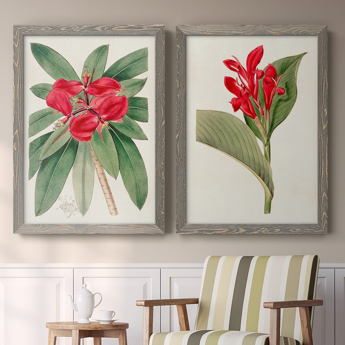Set of two gray barnwood framed canvas prints depicting two antique botanical plate illustrations featuring vivid tropical flowering plants above a sideboard in a cozy sitting room.