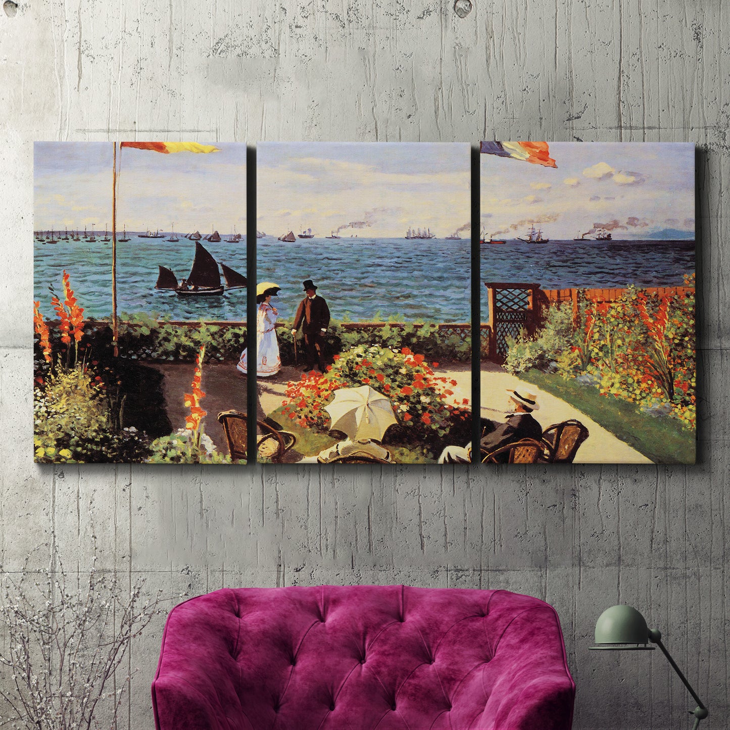 Three-panel canvas wall art featuring coastal garden overlooking sea, displayed in a living room above a suede accent chair.