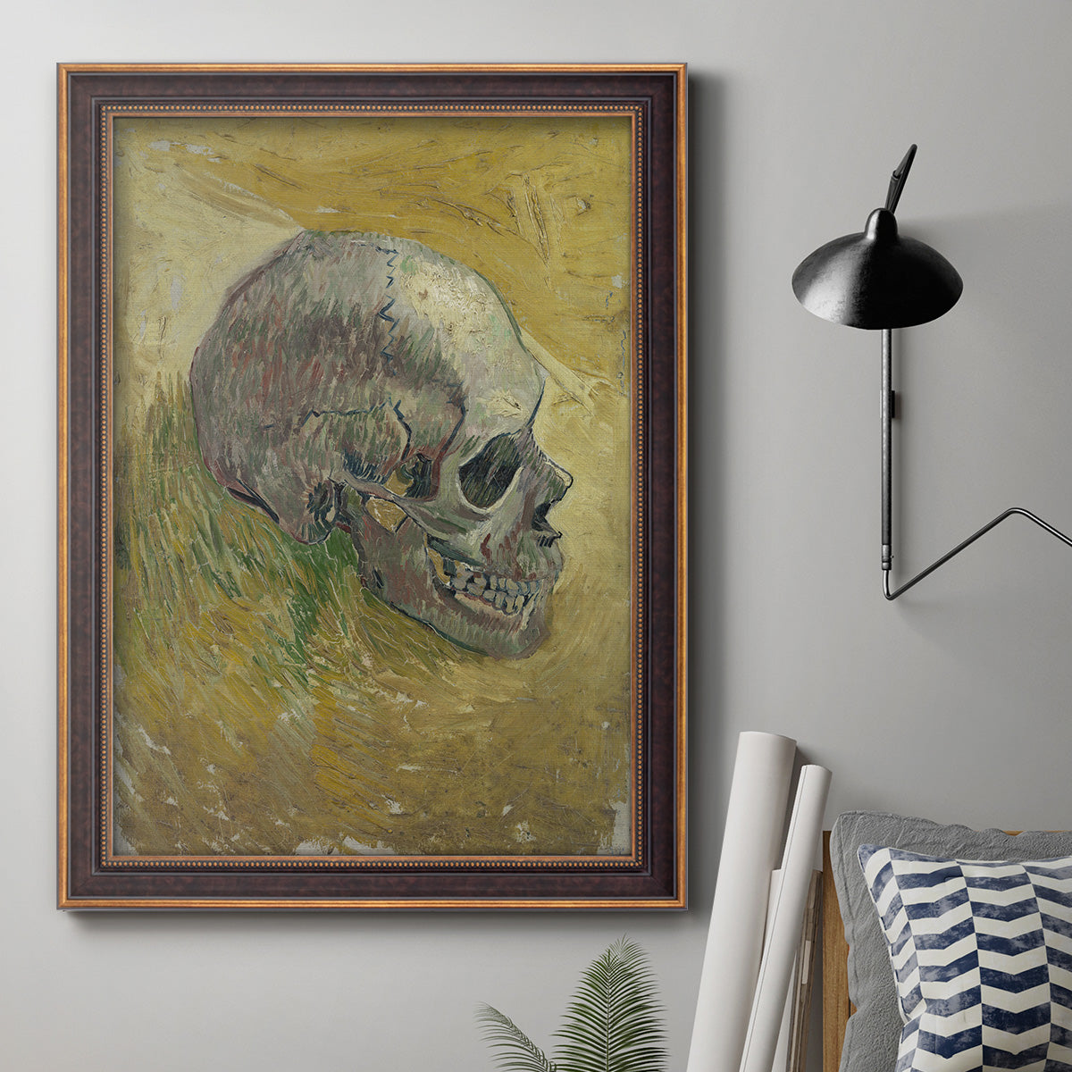 Profile skull study artwork by Vincent van Gogh in an ornate bronzed mahogany wood frame displayed in a neutral interior setting.