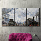 Three-panel canvas wall art featuring playful peach toned floral composition, displayed in a living room above a suede accent chair.