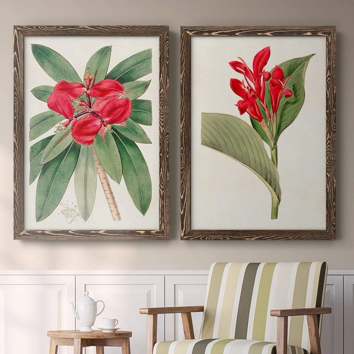 Set of two walnut barnwood framed canvas prints depicting two antique botanical plate illustrations featuring vivid tropical flowering plants above a sideboard in a cozy sitting room.