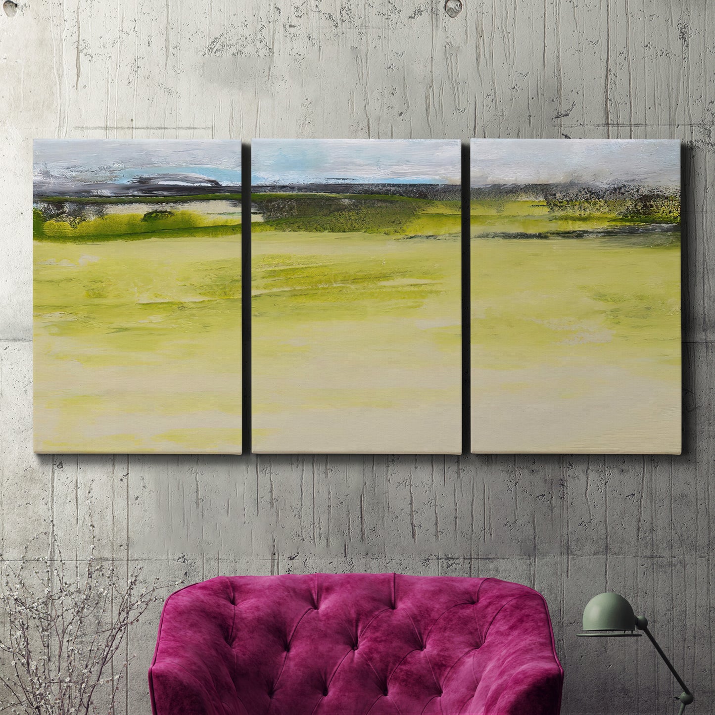 Three-panel canvas wall art featuring abstract terrace landscape view, displayed in a living room above a suede accent chair.