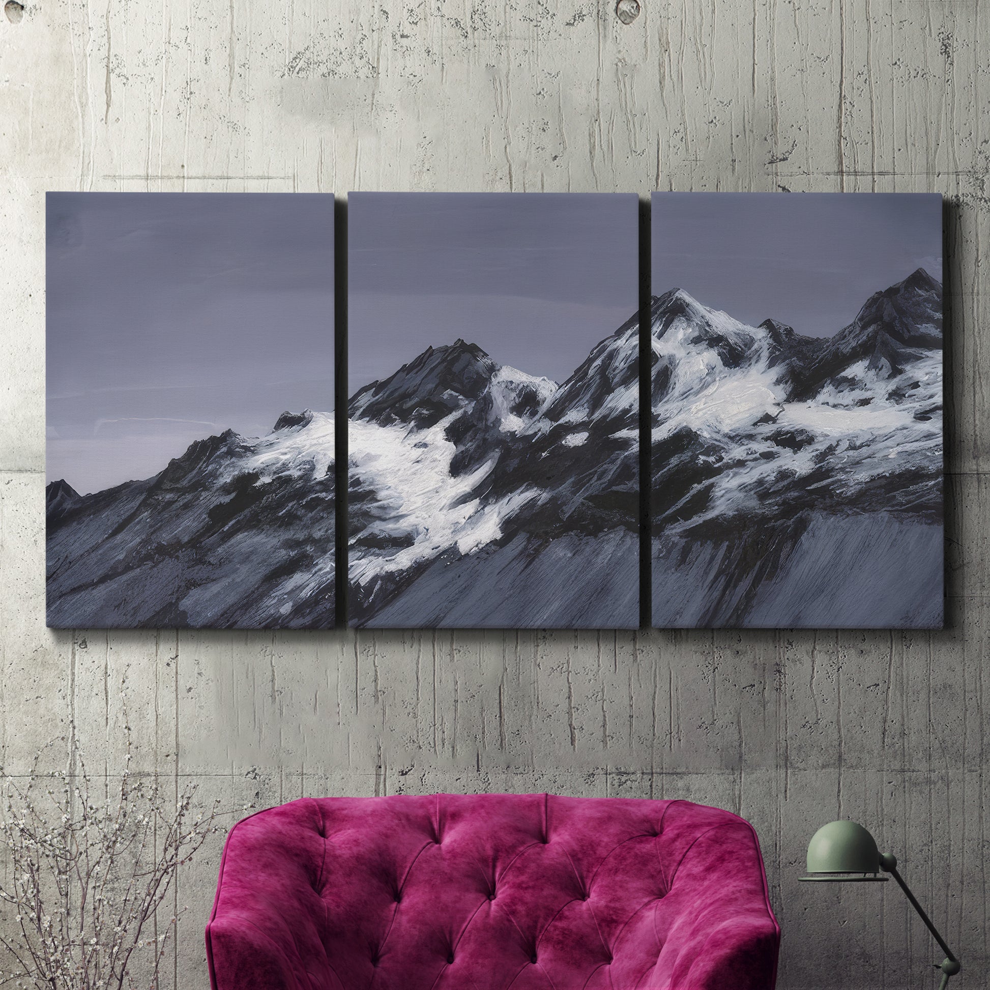 Three-panel canvas wall art featuring moonlit mountain peaks under night sky, displayed in a living room above a suede accent chair.