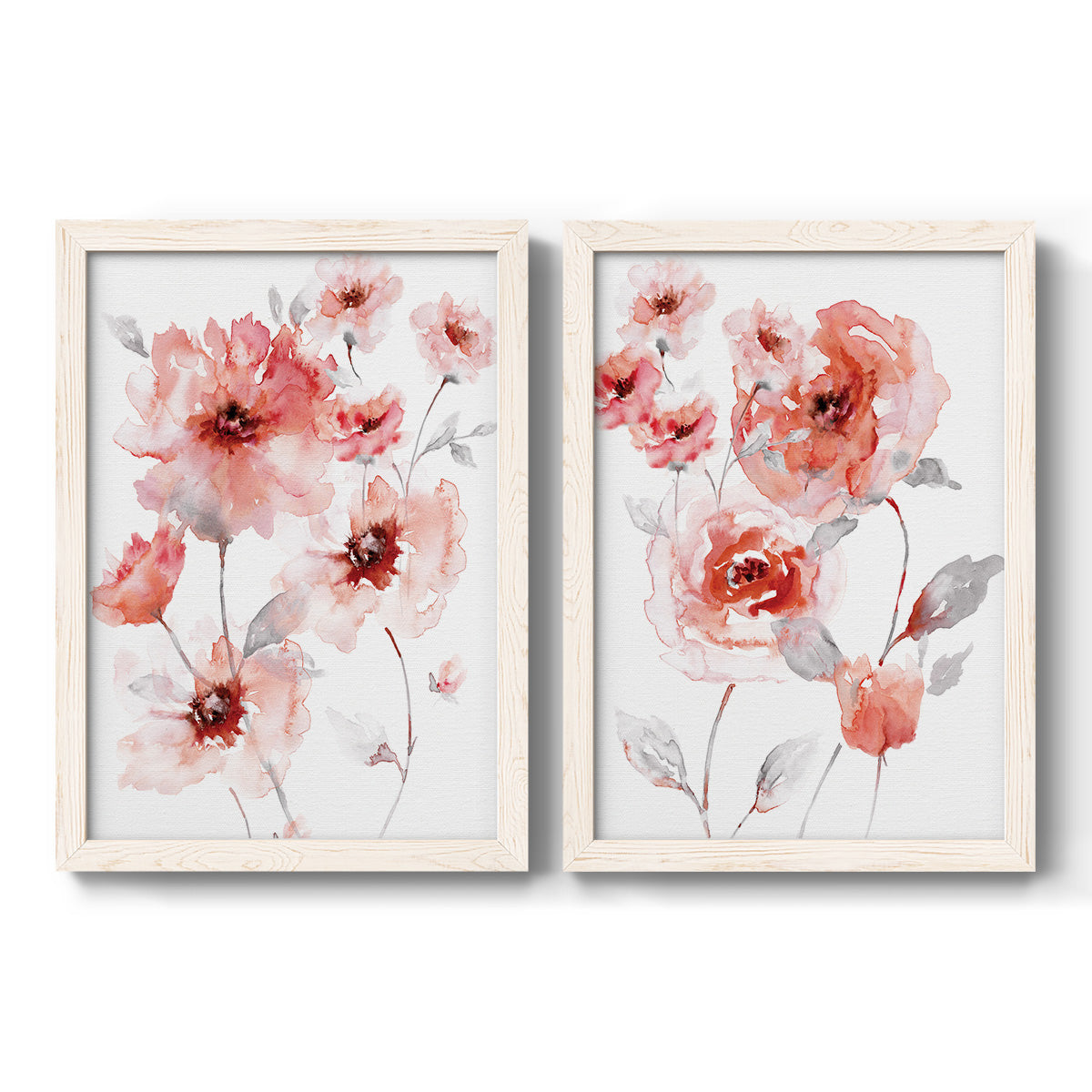Set of two white barnwood framed canvas prints featuring two airy contemporary watercolor florals featuring loose coral pink blossoms on slender gray stems.