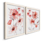 Angled view of a set of two white barnwood framed canvas prints featuring two airy contemporary watercolor florals featuring loose coral pink blossoms on slender gray stems.
