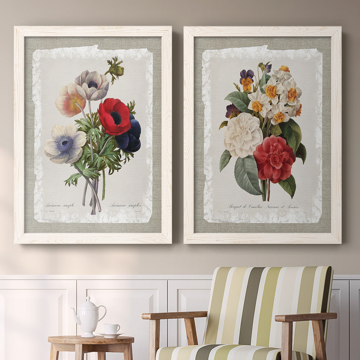 Set of two white barnwood framed canvas prints depicting two traditional botanical collage prints featuring vintage mixed-flower bouquets on distressed paper above a sideboard in a cozy sitting room.