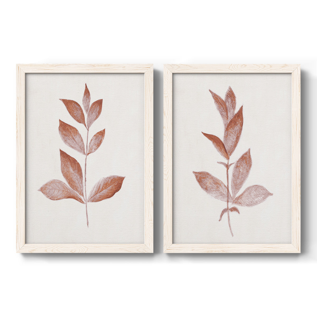 Set of two white barnwood framed canvas prints featuring two minimalist botanical prints featuring single rust-red leafy stems.