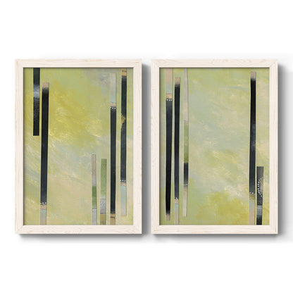 Set of two white barnwood framed canvas prints featuring two minimalist architectural abstracts featuring vertical black gray and olive bars.