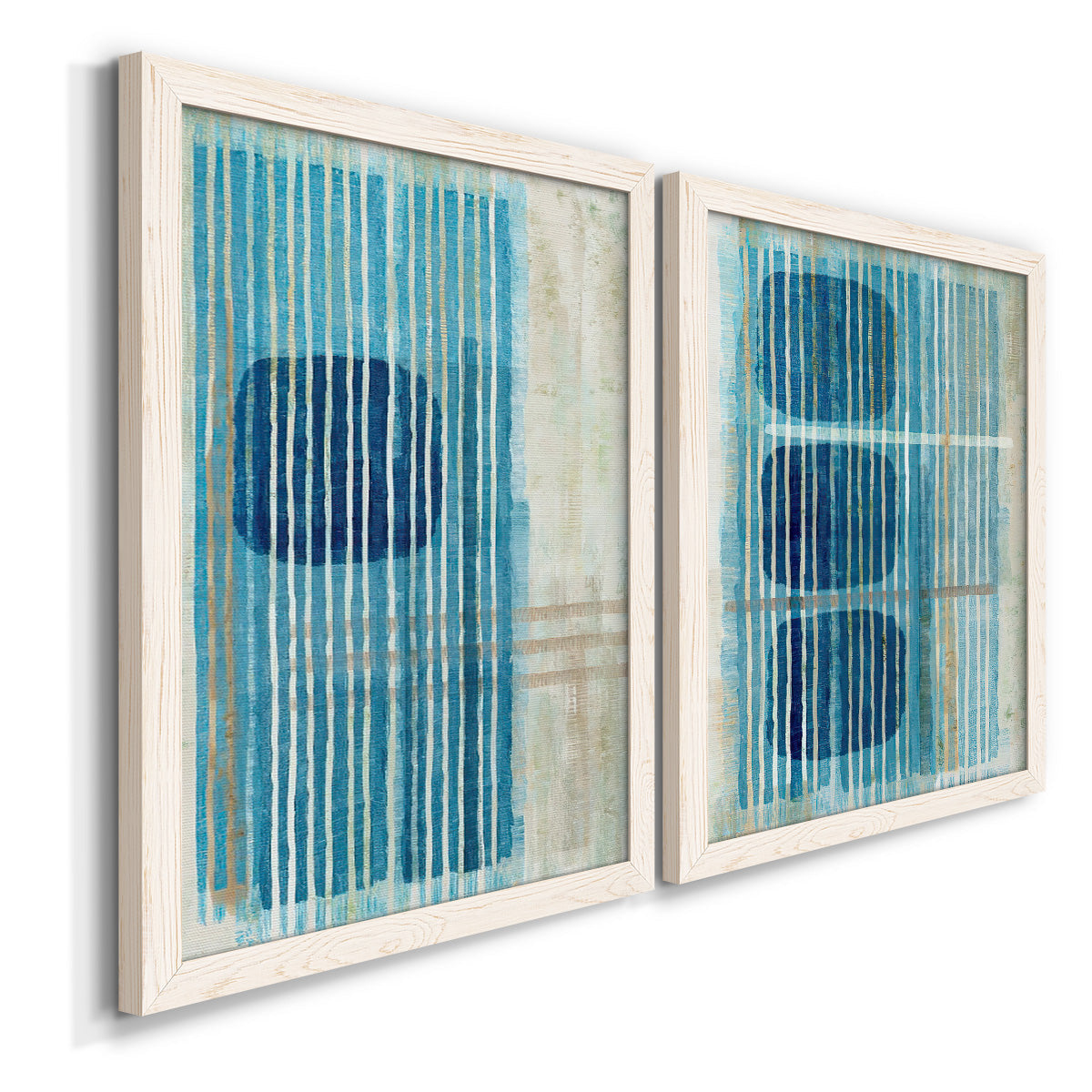 Angled view of a set of two white barnwood framed canvas prints featuring two graphic geometric abstracts featuring stacked blue ovals behind fine vertical stripes.