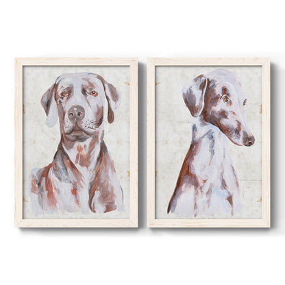 Set of two white barnwood framed canvas prints featuring two traditional watercolor pet paintings featuring gentle seated dog portraits.