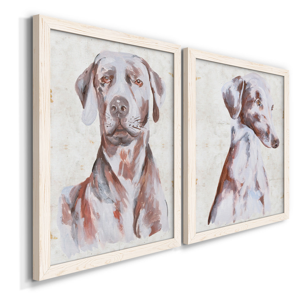 Angled view of a set of two white barnwood framed canvas prints featuring two traditional watercolor pet paintings featuring gentle seated dog portraits.
