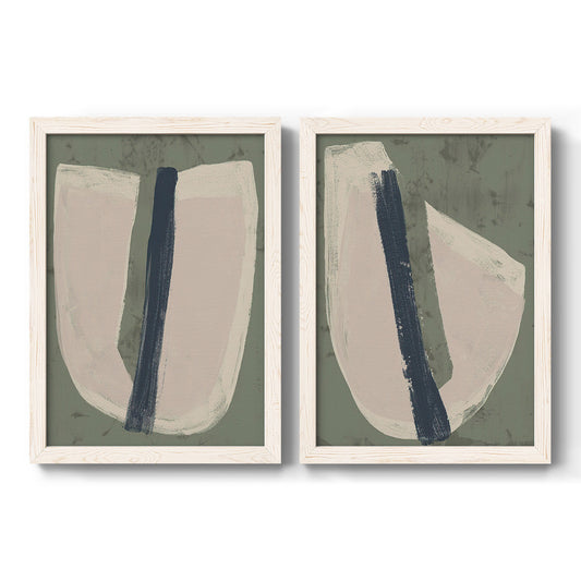 Set of two white barnwood framed canvas prints featuring two minimalist collage-style abstracts featuring single navy brush slashes across layered paper-like shapes.