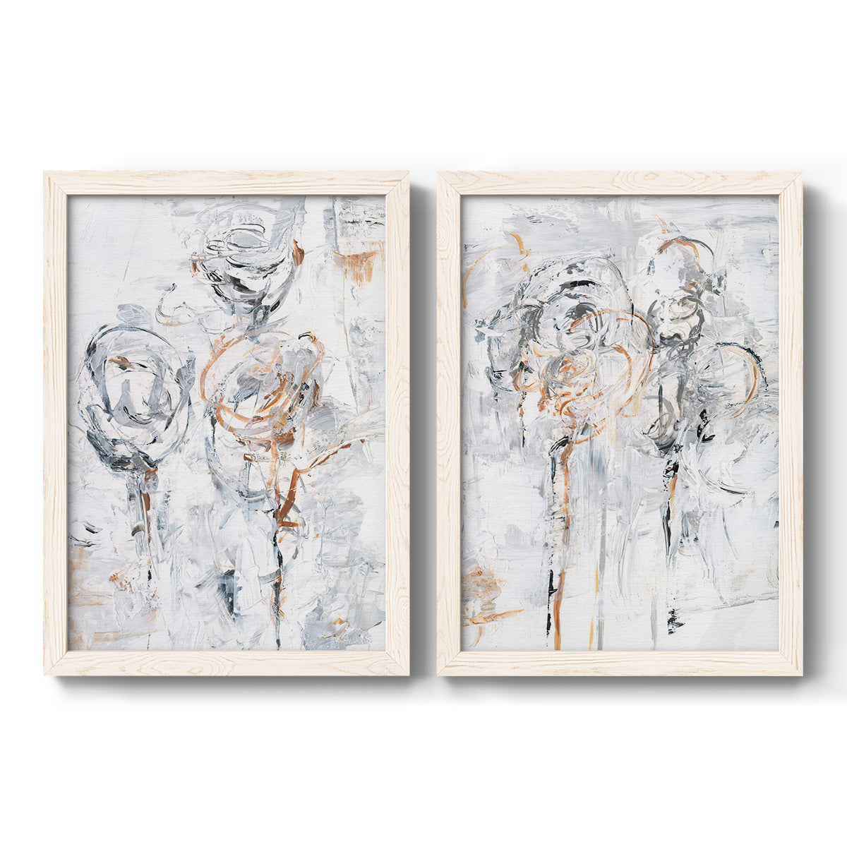 Set of two white barnwood framed canvas prints featuring two expressive floral abstracts featuring loosely suggested flowers and stems in pale gray and peach.