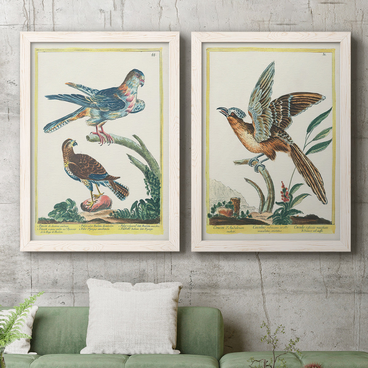 Set of two white barnwood framed canvas prints depicting a coordinated art pair of misty blue gray and violet marks hovering across pale grounds rendered as atmospheric abstract paintings above a sofa in a modern living room.