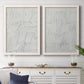 Set of two white barnwood framed canvas prints depicting a coordinated art pair of faint looping handwriting across pale gray grounds rendered as minimalist script abstracts above a dining room sideboard.