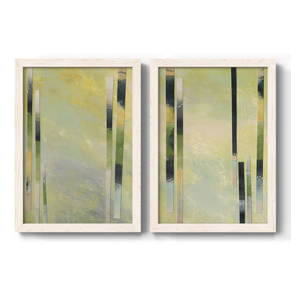 Set of two white barnwood framed canvas prints featuring two minimalist architectural abstracts featuring vertical black gray and olive bars.