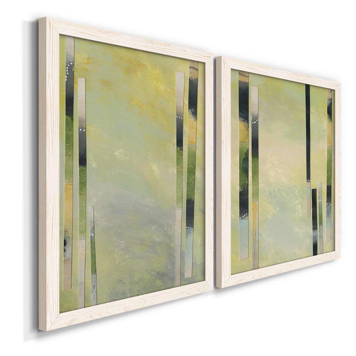 Angled view of a set of two white barnwood framed canvas prints featuring two minimalist architectural abstracts featuring vertical black gray and olive bars.