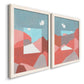 Angled view of a set of two white barnwood framed canvas prints featuring two modern abstract landscapes featuring layered red coral and turquoise desert-like geometry.