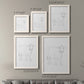 Size comparison chart for a set of two white barnwood framed canvas prints.