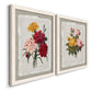 Angled view of a set of two white barnwood framed canvas prints featuring two traditional botanical collage prints featuring vintage mixed-flower bouquets on distressed paper.