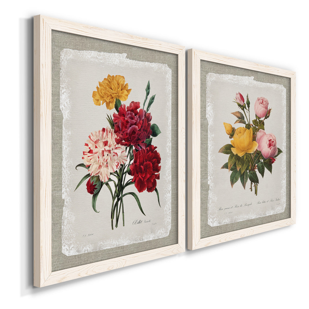 Angled view of a set of two white barnwood framed canvas prints featuring two traditional botanical collage prints featuring vintage mixed-flower bouquets on distressed paper.