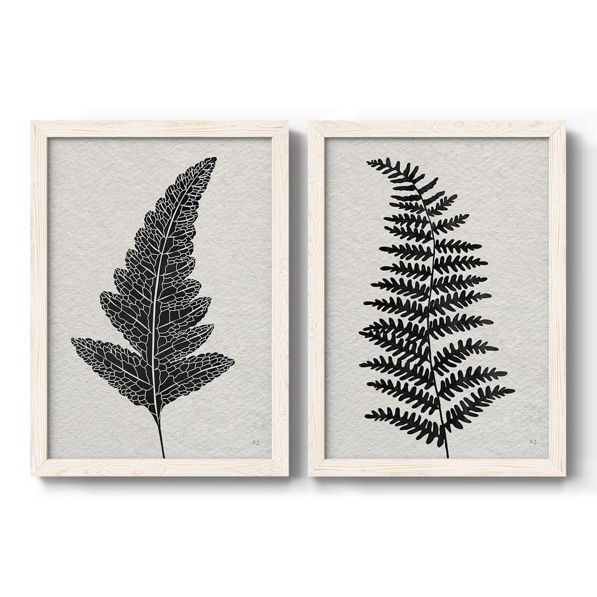 Set of two white barnwood framed canvas prints featuring two minimalist botanical prints featuring black fern leaf silhouettes.