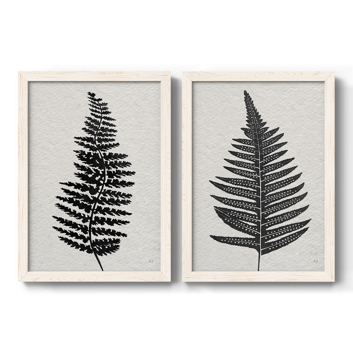 Set of two white barnwood framed canvas prints featuring two minimalist botanical prints featuring black fern leaf silhouettes.