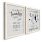 Angled view of a set of two white barnwood framed canvas prints featuring two rustic typographic wall art featuring humorous laundry-room sayings and clothing icons.