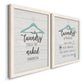 Angled view of a set of two white barnwood framed canvas prints featuring two rustic typographic wall art featuring humorous laundry-room sayings and clothing icons.