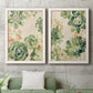 Set of two white barnwood framed canvas prints depicting a coordinated art pair of dense repeating succulents and small flowers rendered as decorative botanical pattern prints above a sofa in a modern living room.