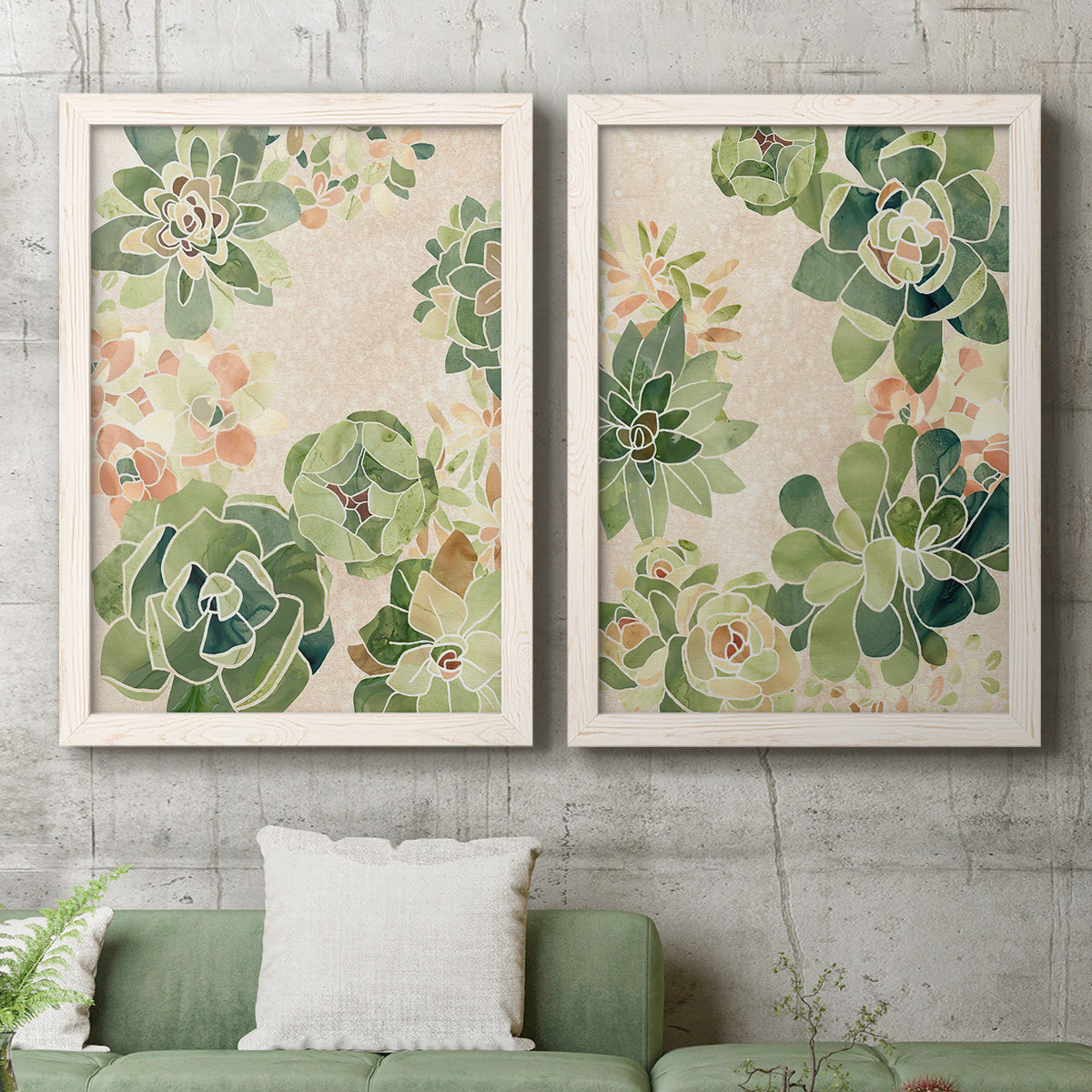 Set of two white barnwood framed canvas prints depicting a coordinated art pair of dense repeating succulents and small flowers rendered as decorative botanical pattern prints above a sofa in a modern living room.