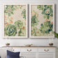 Set of two white barnwood framed canvas prints depicting a coordinated art pair of dense repeating succulents and small flowers rendered as decorative botanical pattern prints above a dining room sideboard.