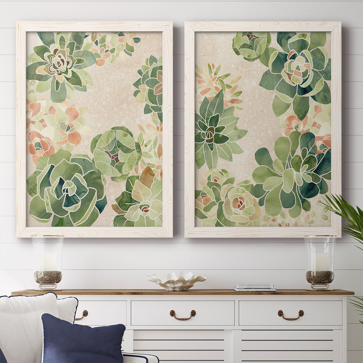 Set of two white barnwood framed canvas prints depicting a coordinated art pair of dense repeating succulents and small flowers rendered as decorative botanical pattern prints above a dining room sideboard.