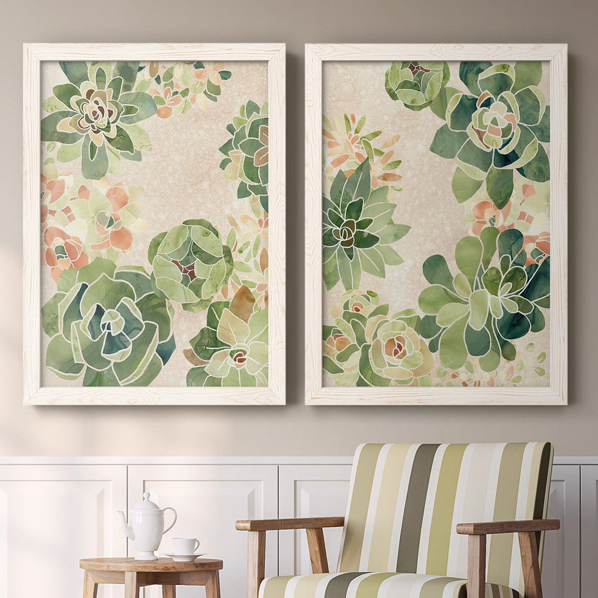 Set of two white barnwood framed canvas prints depicting two decorative botanical pattern prints featuring dense repeating succulents and small flowers above a sideboard in a cozy sitting room.