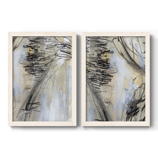Set of two white barnwood framed canvas prints featuring two expressive mixed-media abstracts featuring layered charcoal scribbles and gestural marks.