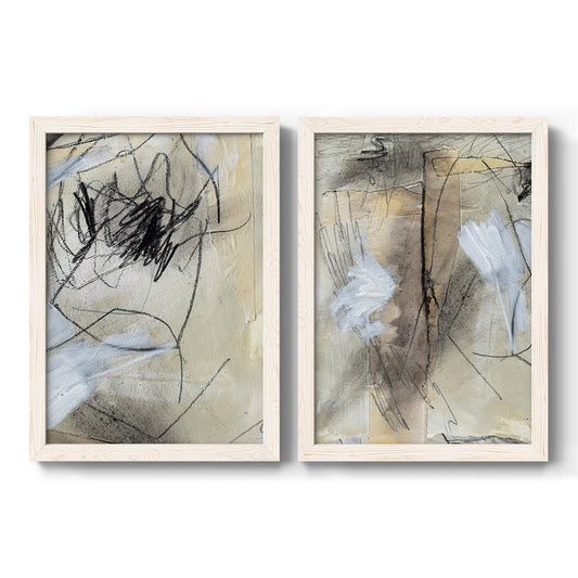 Set of two white barnwood framed canvas prints featuring two expressive mixed-media abstracts featuring layered charcoal scribbles and gestural marks.