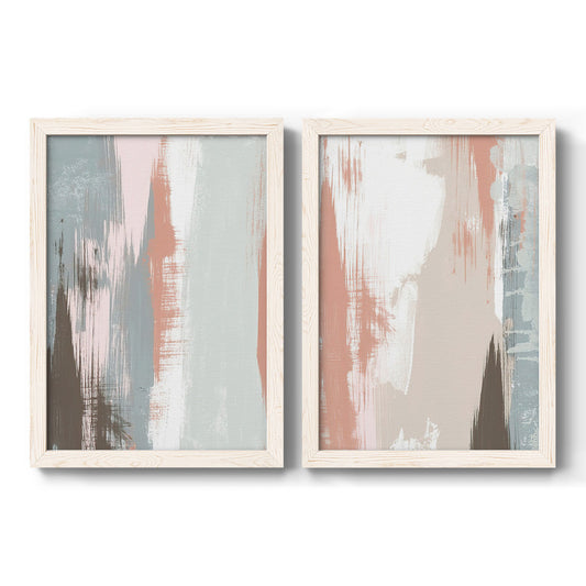 Set of two white barnwood framed canvas prints featuring two neutral color-block abstracts featuring vertical blush gray white and charcoal brush panels.