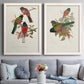Set of two white barnwood framed canvas prints depicting paired vintage ornithological illustrations with detailed plumage, botanical sprigs, and archival cream paper above a sofa in a contemporary living room.