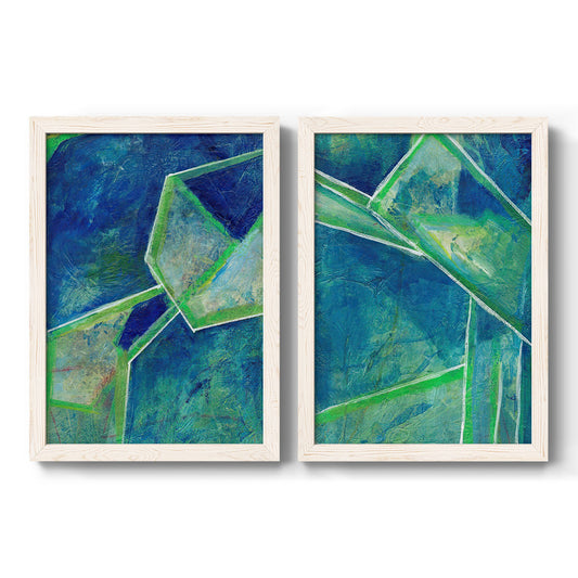 Set of two white barnwood framed canvas prints featuring two textured geometric abstracts featuring interlocking blue and green angular forms.