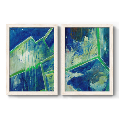 Set of two white barnwood framed canvas prints featuring two textured geometric abstracts featuring interlocking blue and green angular forms.
