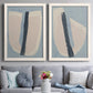 Set of two white barnwood framed canvas prints depicting paired minimalist collage-style abstracts with muted blue green beige fields, torn-edge forms, and bold dark strokes above a sofa in a contemporary living room.