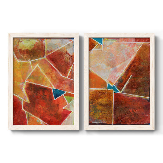 Set of two white barnwood framed canvas prints featuring two warm geometric abstracts featuring faceted rust orange and coral geometric fields.